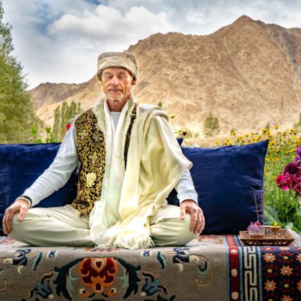 Vasant Swaha sitting in Satsang iin the Himalayas, India
